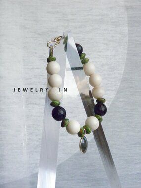 White river stone with black onyx and sterling silver pendant bracelet